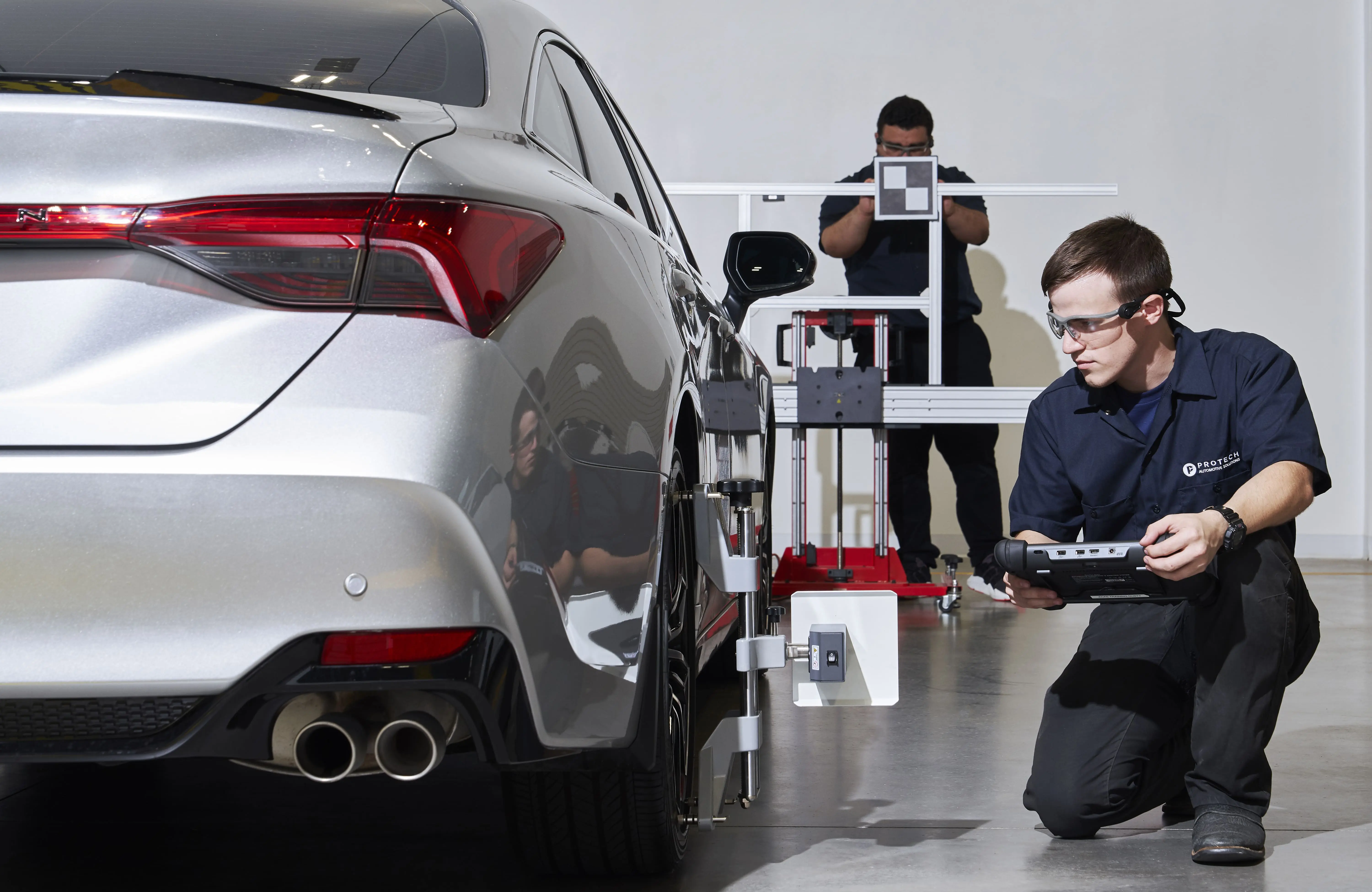 Technician solving ADAS calibration repair needs